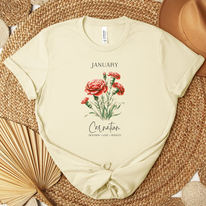 A t-shirt featuring a beautiful carnation for January with traits Devotion, Love, Loyalty. Perfect for January birthdays and floral art lovers. Comfortable and stylish for casual outings or celebrations. Bella+Canvas 3001 t-shirt in natural. ReadyShirtAim.com