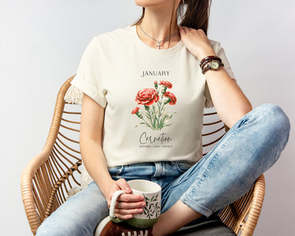 A t-shirt featuring a beautiful carnation for January with traits Devotion, Love, Loyalty. Perfect for January birthdays and floral art lovers. Comfortable and stylish for casual outings or celebrations. Bella+Canvas 3001 t-shirt in natural. ReadyShirtAim.com