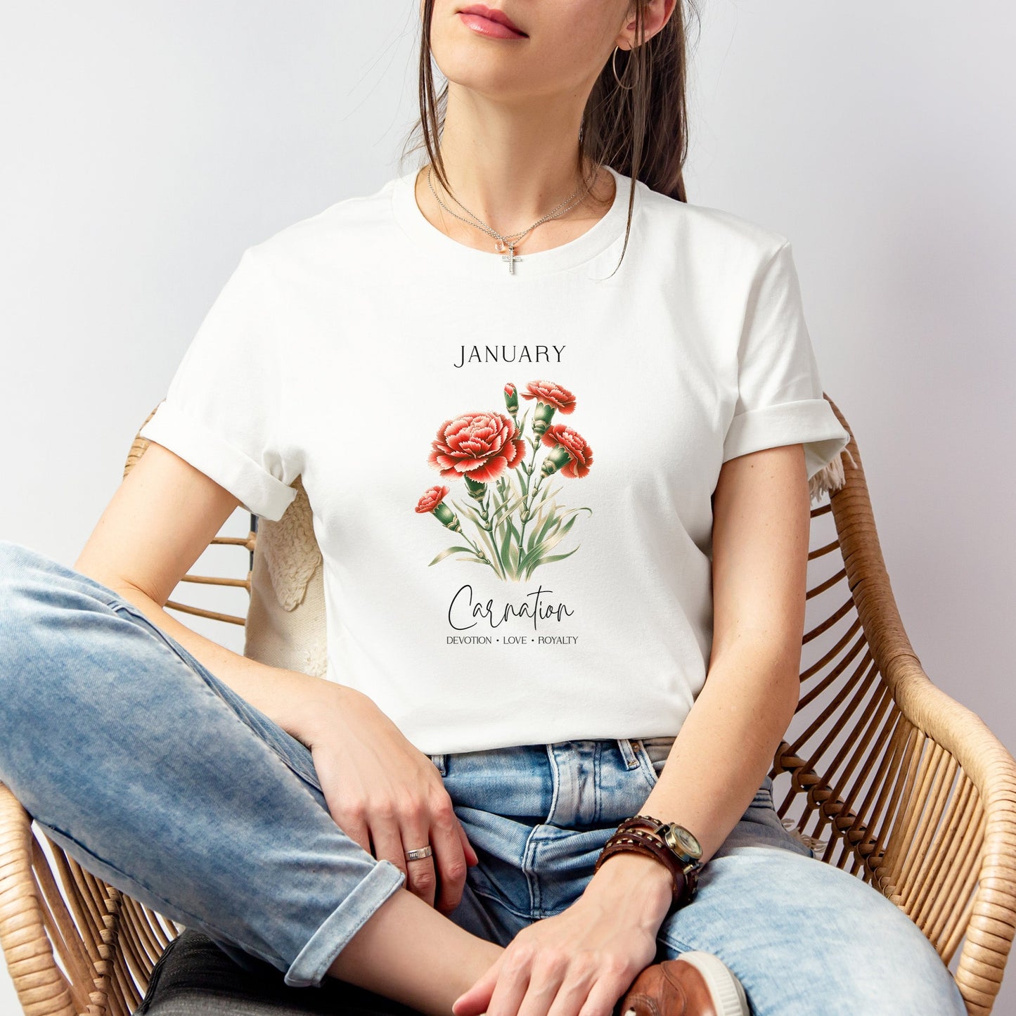 A t-shirt featuring a beautiful carnation for January with traits Devotion, Love, Loyalty. Perfect for January birthdays and floral art lovers. Comfortable and stylish for casual outings or celebrations. Bella+Canvas 3001 t-shirt in white. ReadyShirtAim.com