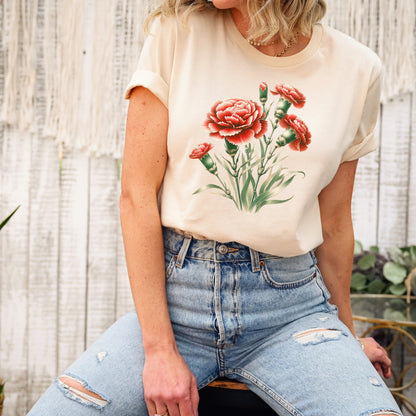 A t-shirt featuring a beautiful carnation for January. Perfect for January birthdays and floral art lovers. Comfortable and stylish for casual outings or celebrations. Bella+Canvas 3001 t-shirt in soft cream. ReadyShirtAim.com