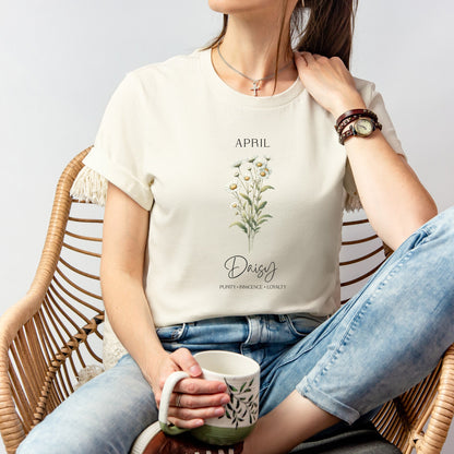 A t-shirt featuring a beautiful daisy for April with traits Purity, Innocence, Loyalty. Perfect for April birthdays and floral art lovers. Comfortable and stylish for casual outings or celebrations. Bella+Canvas 3001 t-shirt in natural. ReadyShirtAim.com