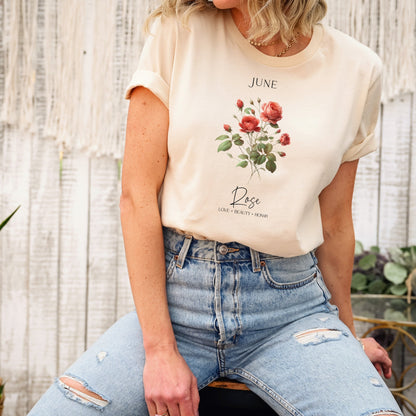 A t-shirt featuring a beautiful rose for June with traits Love, Beauty, Honor. Perfect for June birthdays and floral art lovers. Comfortable and stylish for casual outings or celebrations. Bella+Canvas 3001 t-shirt in soft cream. ReadyShirtAim.com