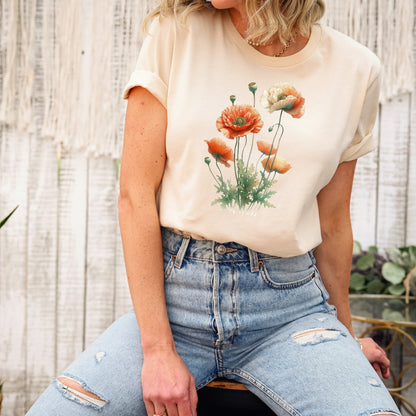 A t-shirt featuring a beautiful poppy for August. Perfect for August birthdays and floral art lovers. Comfortable and stylish for casual outings or celebrations. Bella+Canvas 3001 t-shirt in soft cream. ReadyShirtAim.com