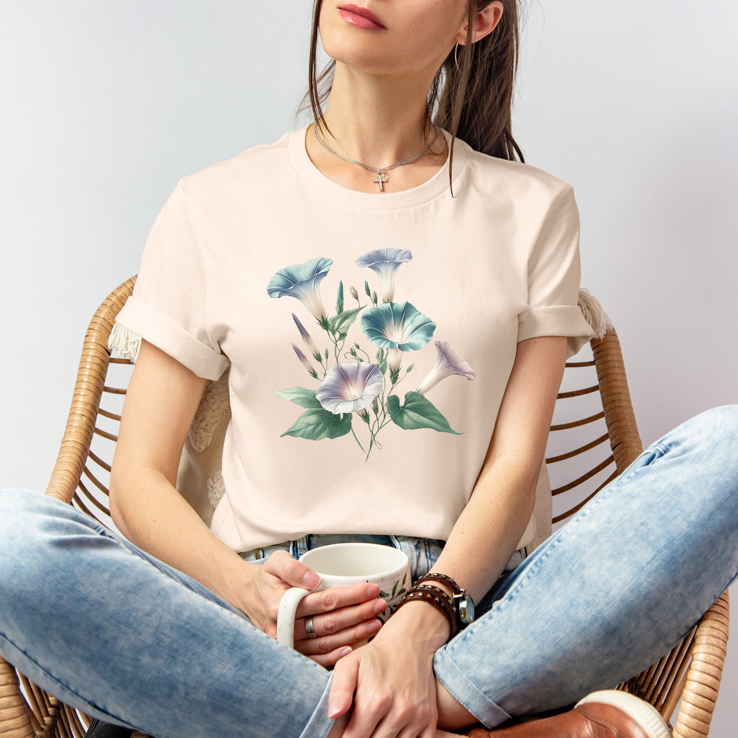 A t-shirt featuring a beautiful morning glory for September. Perfect for September birthdays and floral art lovers. Comfortable and stylish for casual outings or celebrations. Bella+Canvas 3001 t-shirt in soft cream. ReadyShirtAim.com