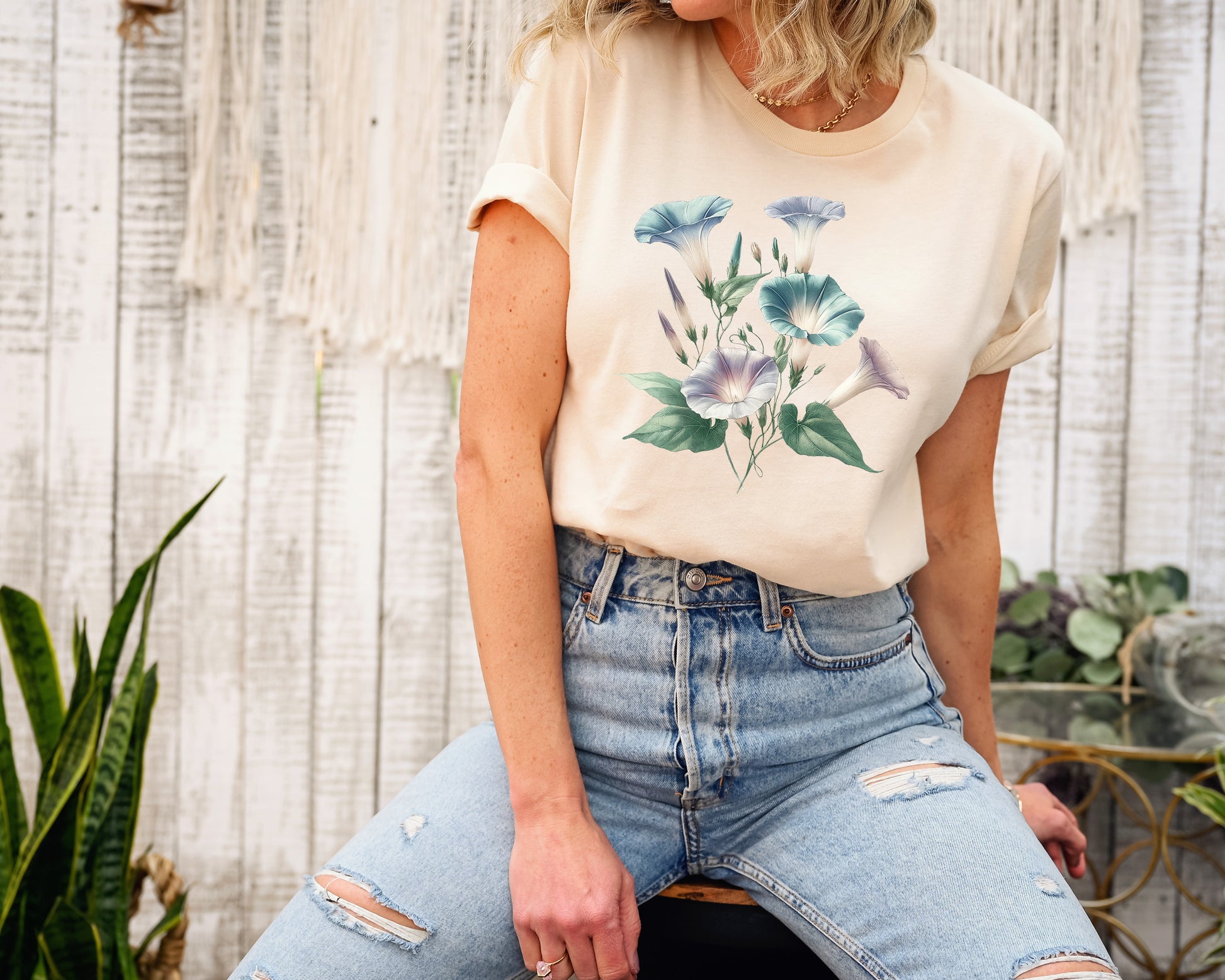 A t-shirt featuring a beautiful morning glory for September. Perfect for September birthdays and floral art lovers. Comfortable and stylish for casual outings or celebrations. Bella+Canvas 3001 t-shirt in soft cream. ReadyShirtAim.com