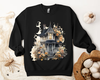 Halloween Boho Sweatshirt for Women featuring a haunted house illustration with boho design elements. Perfect for autumn festivities and casual wear. Gildan 18000 sweatshirt in Black. ReadyShirtAim.com