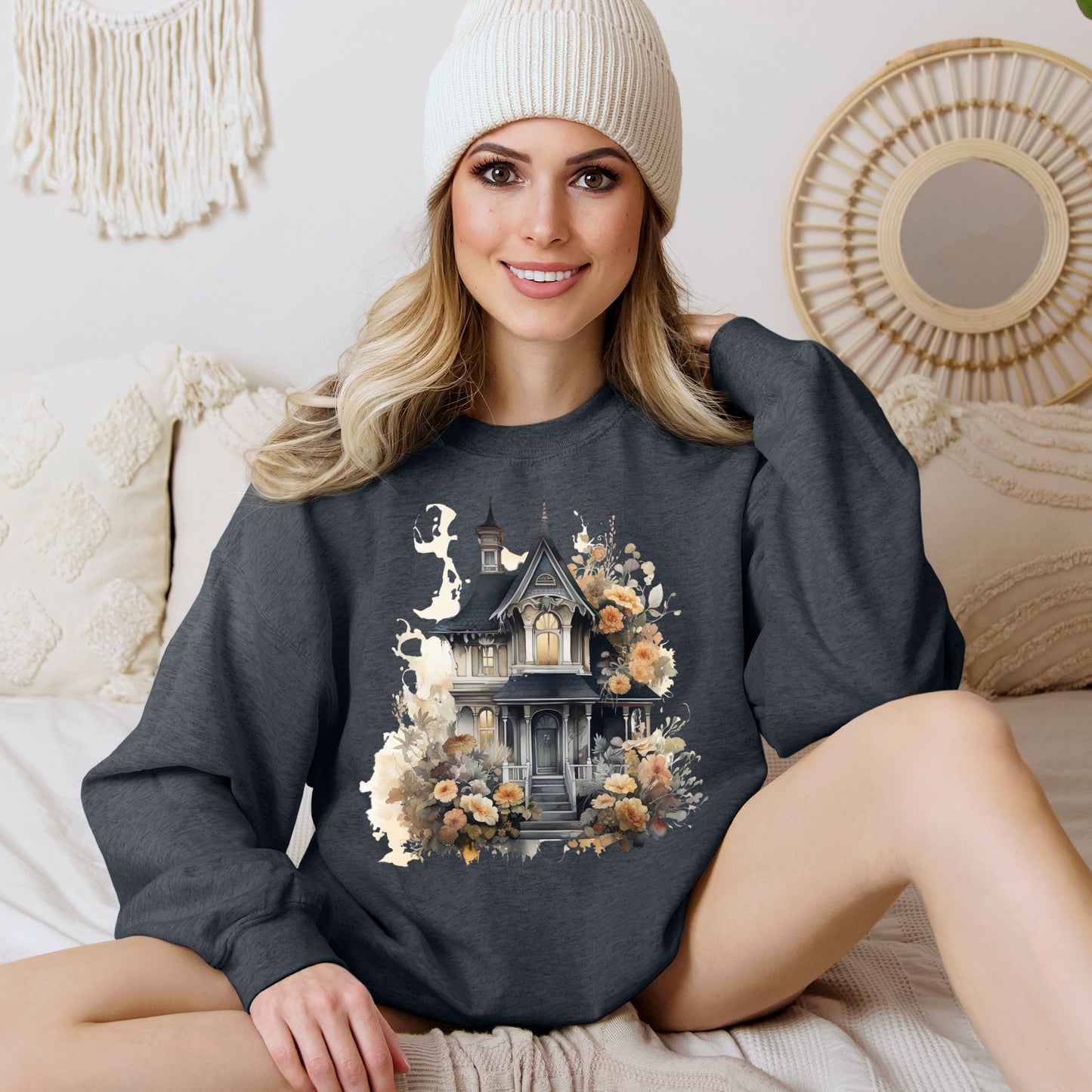 Halloween Boho Sweatshirt for Women featuring a haunted house illustration with boho design elements. Perfect for autumn festivities and casual wear. Available in multiple dark and light colors and sizes. Gildan 18000 sweatshirt in Dark Grey Heather. ReadyShirtAim.com