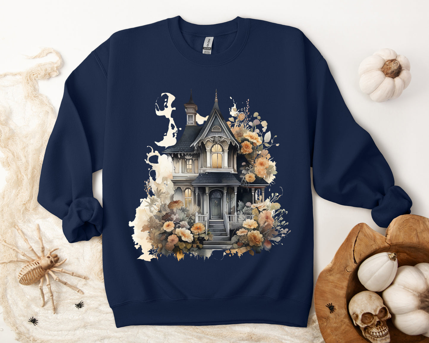 Halloween Boho Sweatshirt for Women featuring a haunted house illustration with boho design elements. Perfect for autumn festivities and casual wear. Available in multiple dark and light colors and sizes. Gildan 18000 sweatshirt in Navy. ReadyShirtAim.com