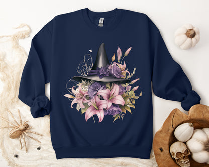 Enchanting Bohemian Witch Hat Sweatshirt with a watercolor illustration of a black witch hat surrounded by flowers in purple, pink, and green tones. Available in multiple dark ang light colors and sizes. Gildan 18000 sweatshirt in Navy. ReadyShirtAim.com