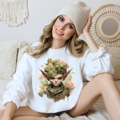 Whimsical Goblin & Floral Boho Halloween Sweatshirt for women. Features a charming goblin surrounded by delicate florals. Perfect for Halloween celebrations. Available in multiple dark and light colors and sizes. Gildan 18000 sweatshirt in white. ReadyShirtAim.com