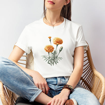 A t-shirt featuring a beautiful marigold for October. Perfect for October birthdays and floral art lovers. Comfortable and stylish for casual outings or celebrations. Bella+Canvas 3001 t-shirt in white. ReadyShirtAim.com