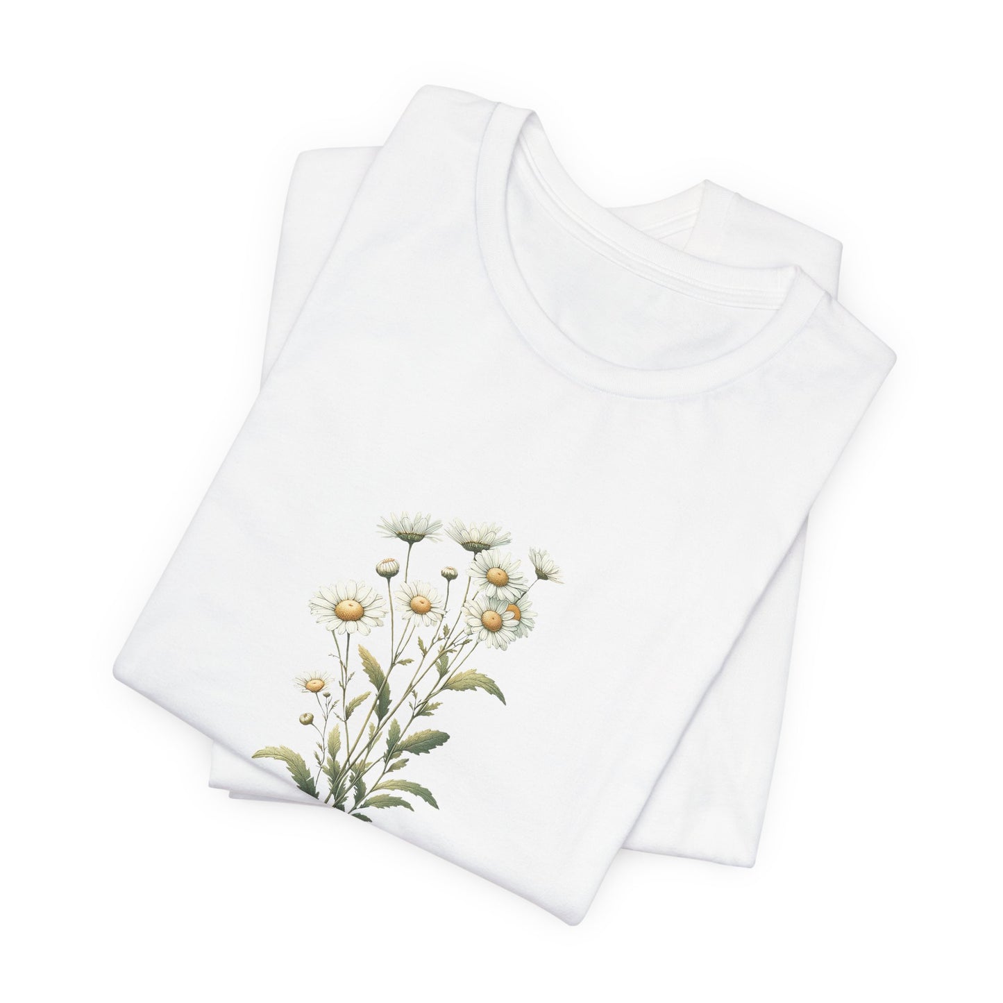 A t-shirt featuring a beautiful daisy for April. Perfect for April birthdays and floral art lovers. Comfortable and stylish for casual outings or celebrations. Bella+Canvas 3001 t-shirt in white. ReadyShirtAim.com