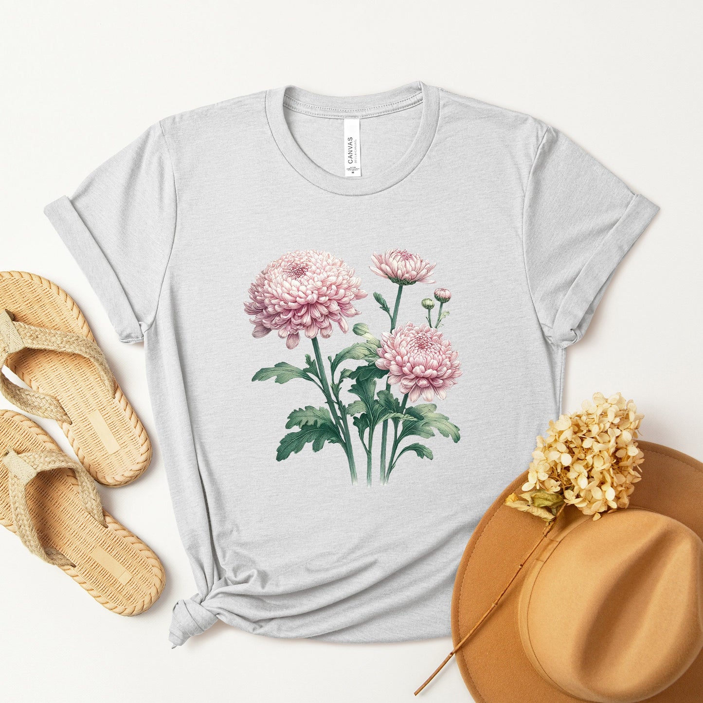 A t-shirt featuring a beautiful chrysanthemum for November. Perfect for November birthdays and floral art lovers. Comfortable and stylish for casual outings or celebrations. Bella+Canvas 3001 t-shirt in ash. ReadyShirtAim.com