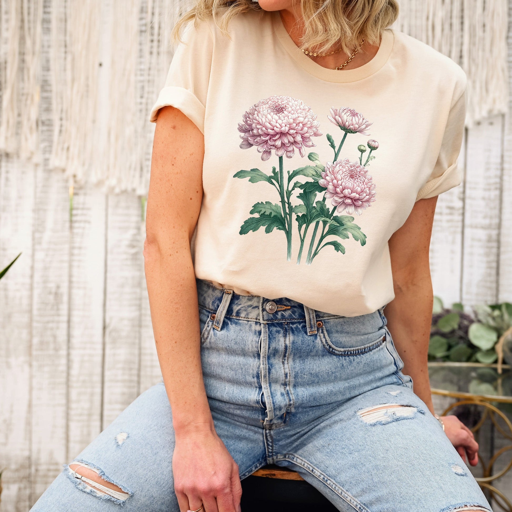 A t-shirt featuring a beautiful chrysanthemum for November. Perfect for November birthdays and floral art lovers. Comfortable and stylish for casual outings or celebrations. Bella+Canvas 3001 t-shirt in soft cream. ReadyShirtAim.com