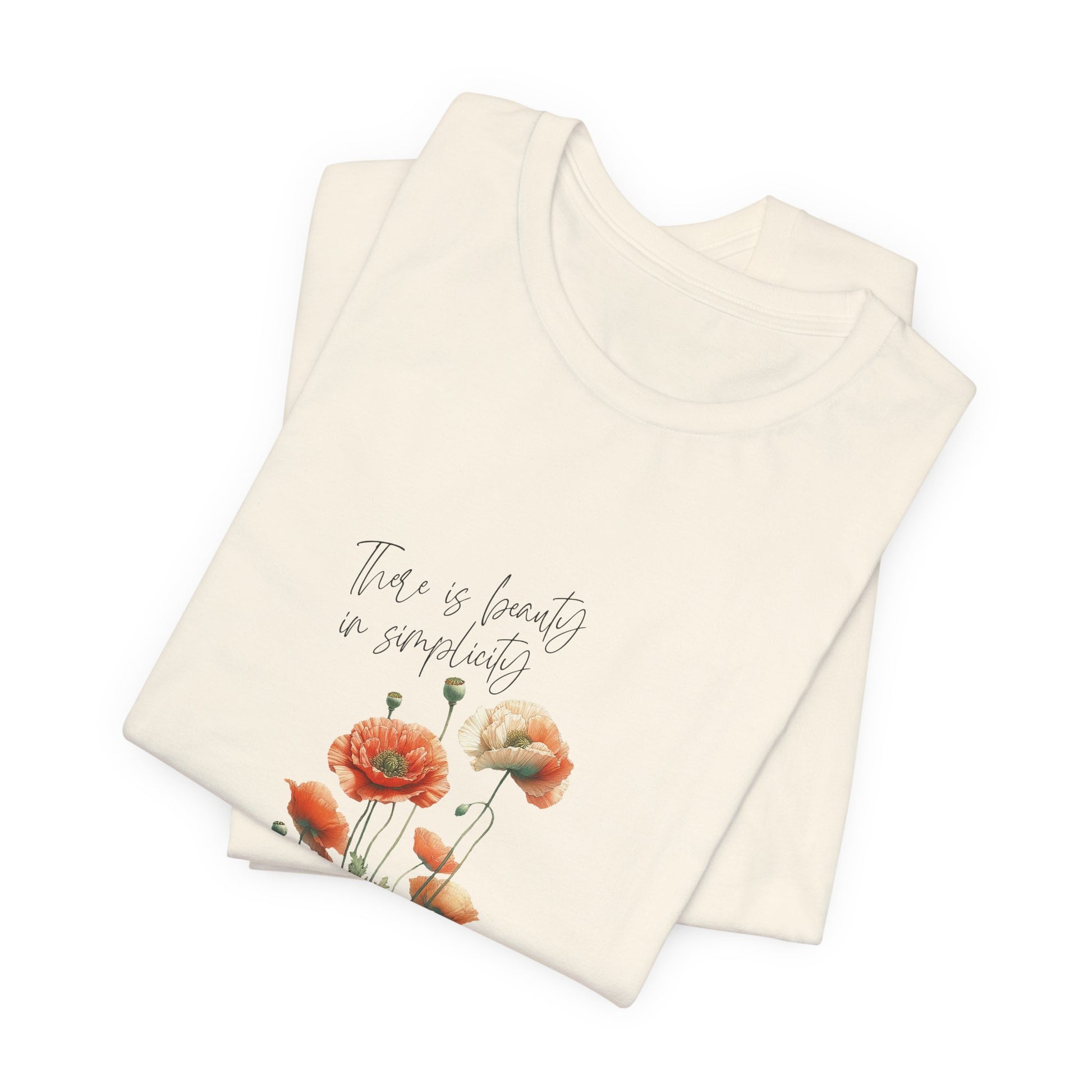 A t-shirt featuring a beautiful poppy for August with the quote “There is beauty in simplicity.” Perfect for August birthdays and floral art lovers. Comfortable and stylish for casual outings or celebrations. Bella+Canvas 3001 t-shirt in natural. ReadyShirtAim.com