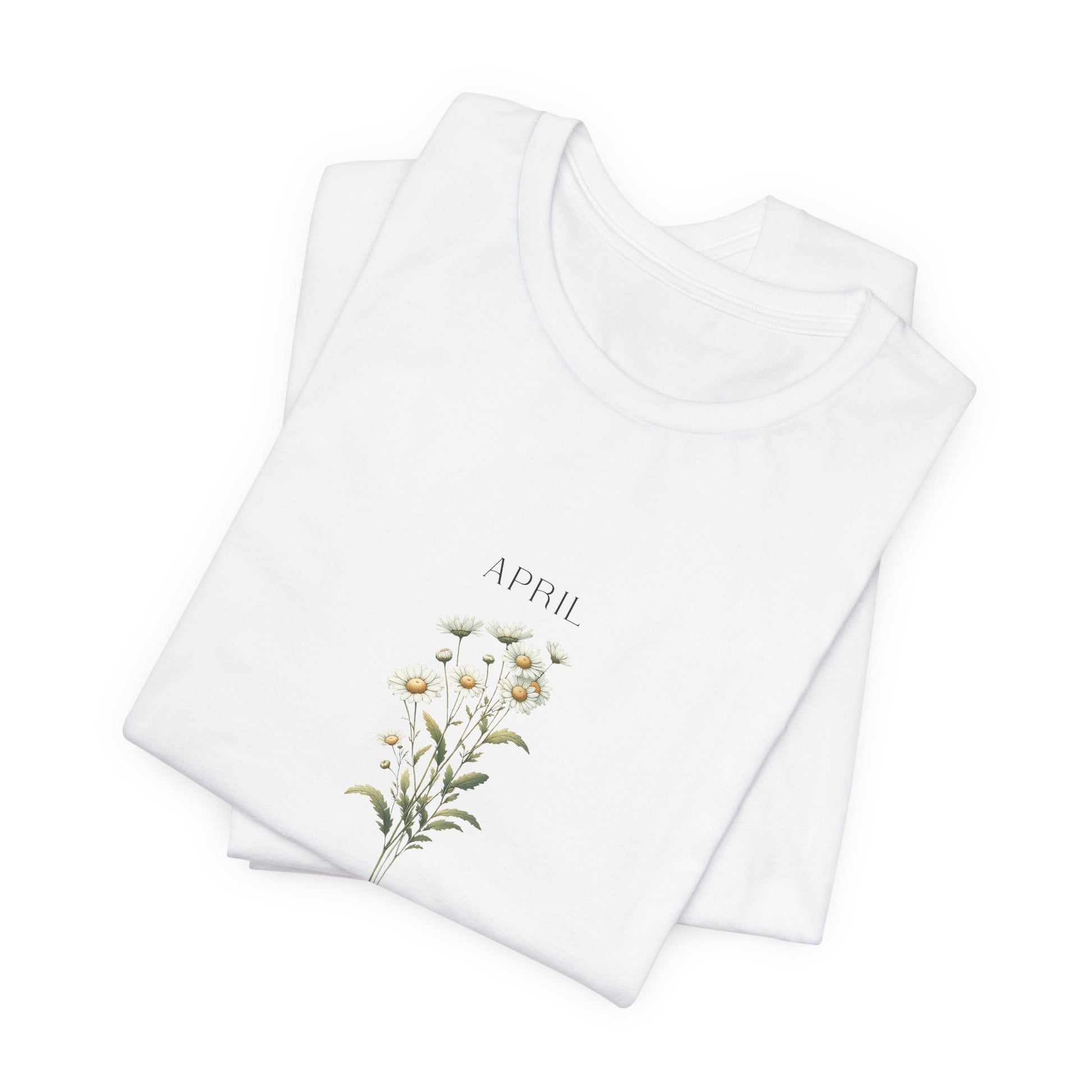 A t-shirt featuring a beautiful daisy for April with traits Purity, Innocence, Loyalty. Perfect for April birthdays and floral art lovers. Comfortable and stylish for casual outings or celebrations. Bella+Canvas 3001 t-shirt in white. ReadyShirtAim.com