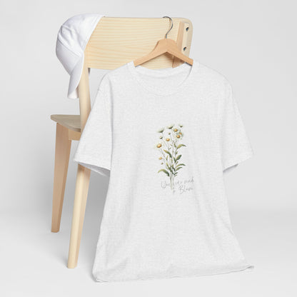 A t-shirt featuring a beautiful daisy for April with the quote “You were made to bloom.” Perfect for April birthdays and floral art lovers. Comfortable and stylish for casual outings or celebrations. Bella+Canvas 3001 t-shirt in ash. ReadyShirtAim.com