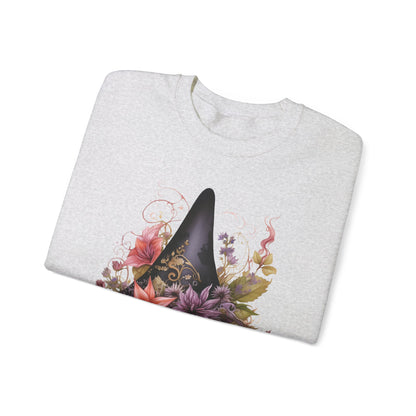 Whimsical Witch Hat Sweatshirt with a watercolor illustration of a black witch hat surrounded by flowers in purple, pink, and green. Available in multiple dark and light colors and sizes. Gildan 18000 sweatshirt in ash. ReadyShirtAim.com