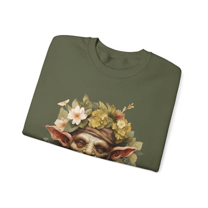 Creepy Cute Goblin Floral Boho Halloween Sweatshirt for women. Features a charming goblin surrounded by muted florals. Perfect for Halloween celebrations. Available in multiple dark and light colors and sizes. Gildan 18000 sweatshirt in Military Green. ReadyShirtAim.com