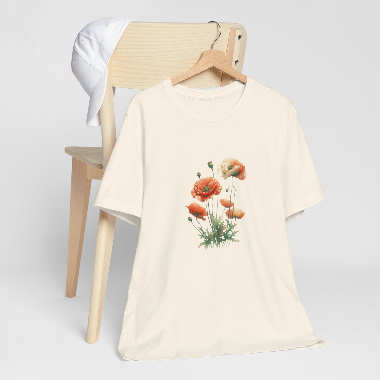 A t-shirt featuring a beautiful poppy for August. Perfect for August birthdays and floral art lovers. Comfortable and stylish for casual outings or celebrations. Bella+Canvas 3001 t-shirt in natural. ReadyShirtAim.com