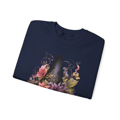 Whimsical Witch Hat Sweatshirt with a watercolor illustration of a black witch hat surrounded by flowers in purple, pink, and green. Available in multiple dark and light colors and sizes. Gildan 18000 sweatshirt in Navy. ReadyShirtAim.com