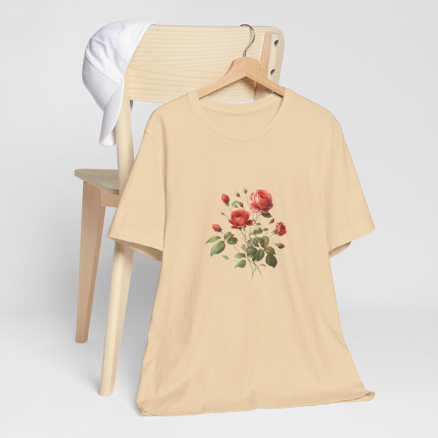 A t-shirt featuring a beautiful rose for June. Perfect for June birthdays and floral art lovers. Comfortable and stylish for casual outings or celebrations. Bella+Canvas 3001 t-shirt in soft cream. ReadyShirtAim.com