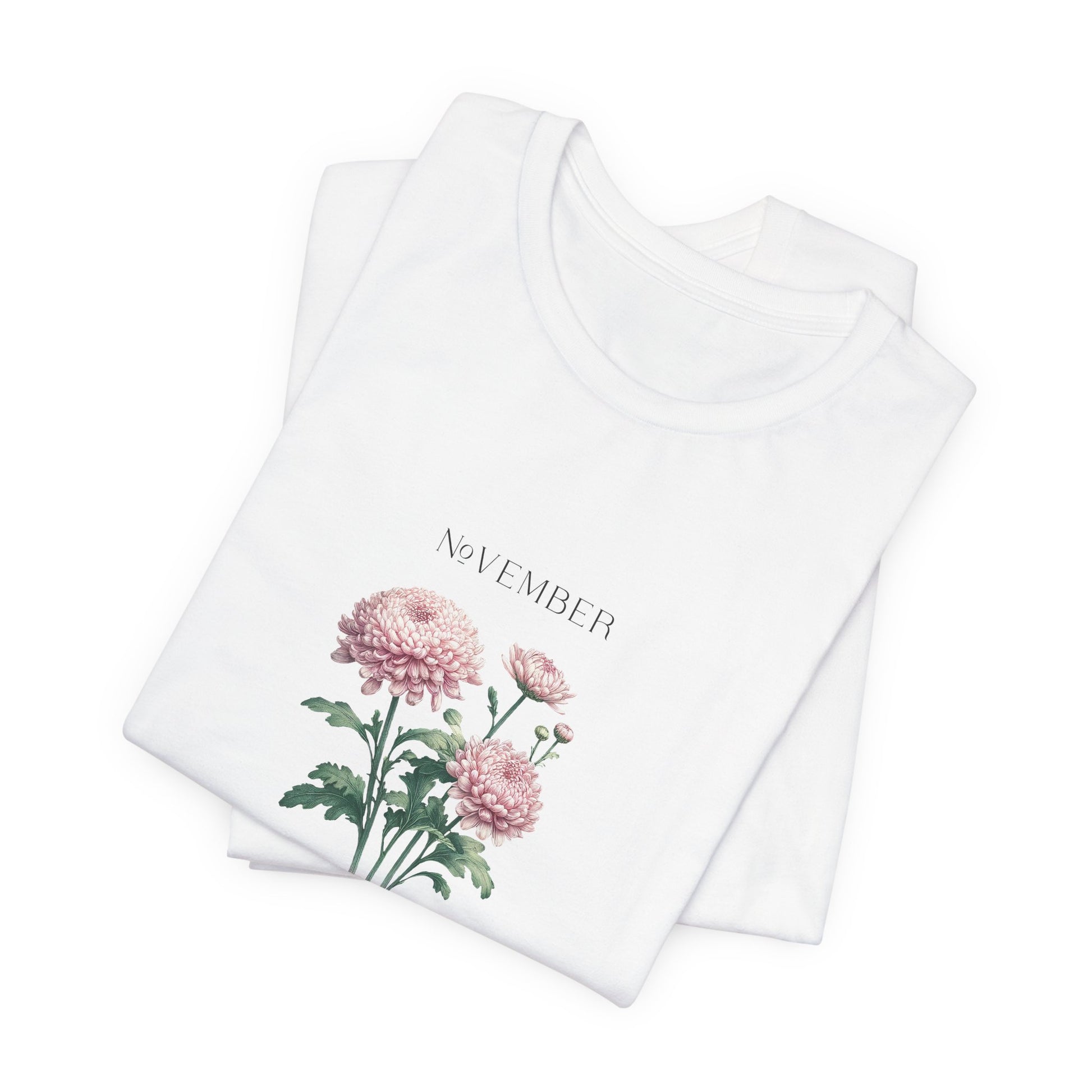 A t-shirt featuring a beautiful chrysanthemum for November with traits Longevity, Optimism, Joy. Perfect for November birthdays and floral art lovers. Comfortable and stylish for casual outings or celebrations. Bella+Canvas 3001 t-shirt in white. ReadyShirtAim.com