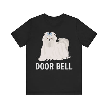 "Door Bell" Maltese Dog T-Shirt for Unisex with a beige silhouette of a Maltese dog and playful "Door Bell" text underneath. Ideal for dog lovers with a sense of humor. Available in multiple colors and sizes. Bella+Canvas 3001 t-shirt in black. ReadyShirtAim.com