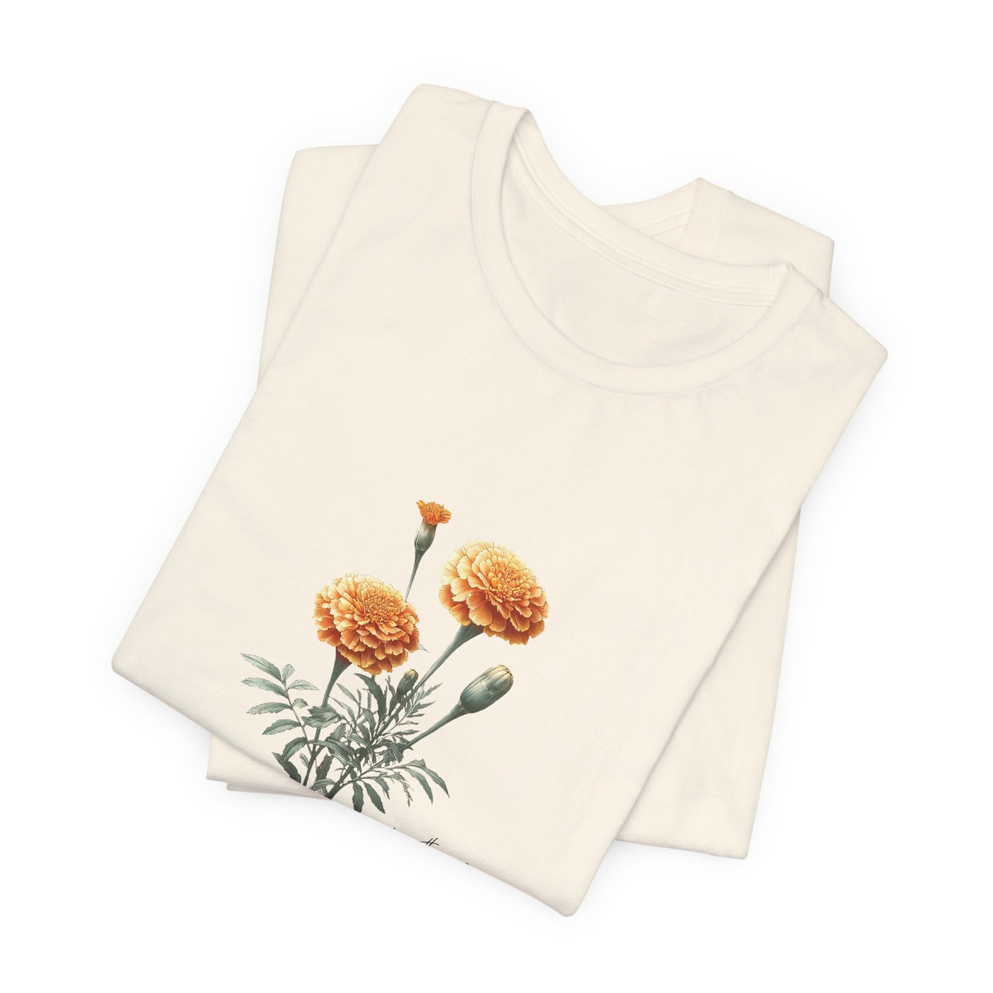 A t-shirt featuring a beautiful marigold for October with the quote “Expect nothing, appreciate everything.” Perfect for October birthdays and floral art lovers. Comfortable and stylish for casual outings or celebrations. Bella+Canvas 3001 t-shirt in natural. ReadyShirtAim.com