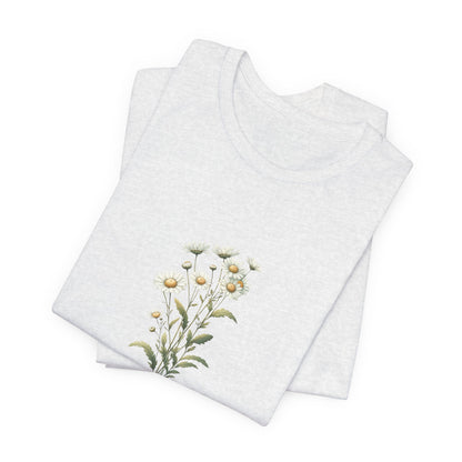 A t-shirt featuring a beautiful daisy for April with the quote “You were made to bloom.” Perfect for April birthdays and floral art lovers. Comfortable and stylish for casual outings or celebrations. Bella+Canvas 3001 t-shirt in ash. ReadyShirtAim.com