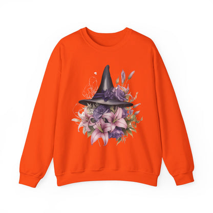 Enchanting Bohemian Witch Hat Sweatshirt with a watercolor illustration of a black witch hat surrounded by flowers in purple, pink, and green tones. Available in multiple dark ang light colors and sizes. Gildan 18000 sweatshirt in Orange. ReadyShirtAim.com