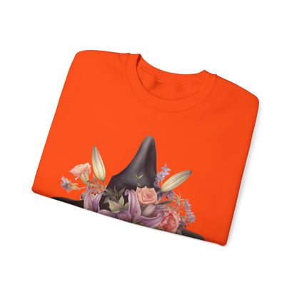 Elegant Witchy Blooms Sweatshirt with a watercolor illustration of a black witch hat and flowers in purple, pink, and green. Available in multiple dark and light colors and sizes. Gildan 18000 sweatshirt in Orange. ReadyShirtAim.com