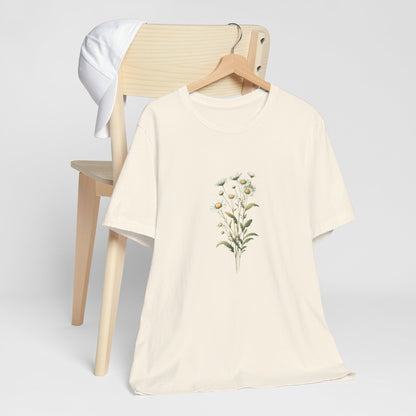 A t-shirt featuring a beautiful daisy for April. Perfect for April birthdays and floral art lovers. Comfortable and stylish for casual outings or celebrations. Bella+Canvas 3001 t-shirt in natural. ReadyShirtAim.com