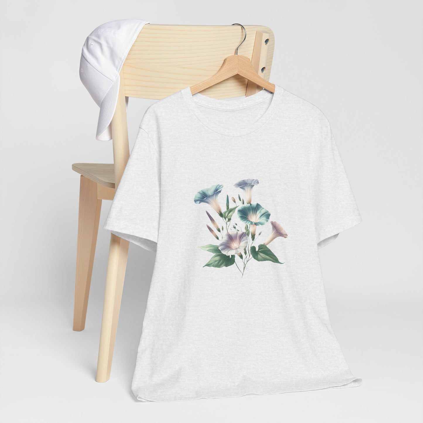 A t-shirt featuring a beautiful morning glory for September. Perfect for September birthdays and floral art lovers. Comfortable and stylish for casual outings or celebrations. Bella+Canvas 3001 t-shirt in ash. ReadyShirtAim.com