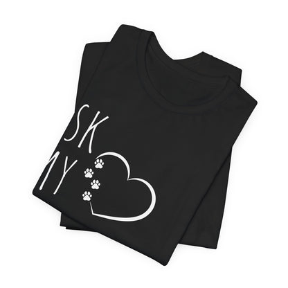 "Ask My Maltese" T-Shirt featuring a heart with two paw prints, perfect for dog lovers and Maltese owners. Unisex design for men and women. Available in multiple colors and sizes. Bella+Canvas 3001 t-shirt in black. ReadyShirtAim.com