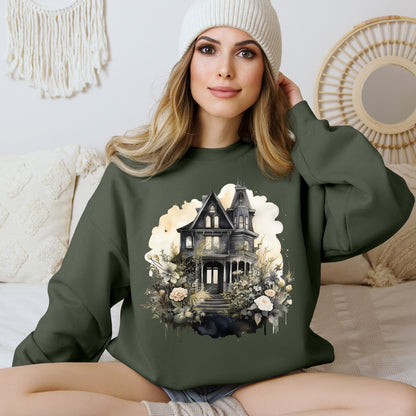 Halloween Boho Sweatshirt for Women featuring a mystical midnight haunted house illustration with boho design accents. Perfect for autumn festivities and casual wear. Gildan 18000 sweatshirt in Military Green. ReadyShirtAim.com