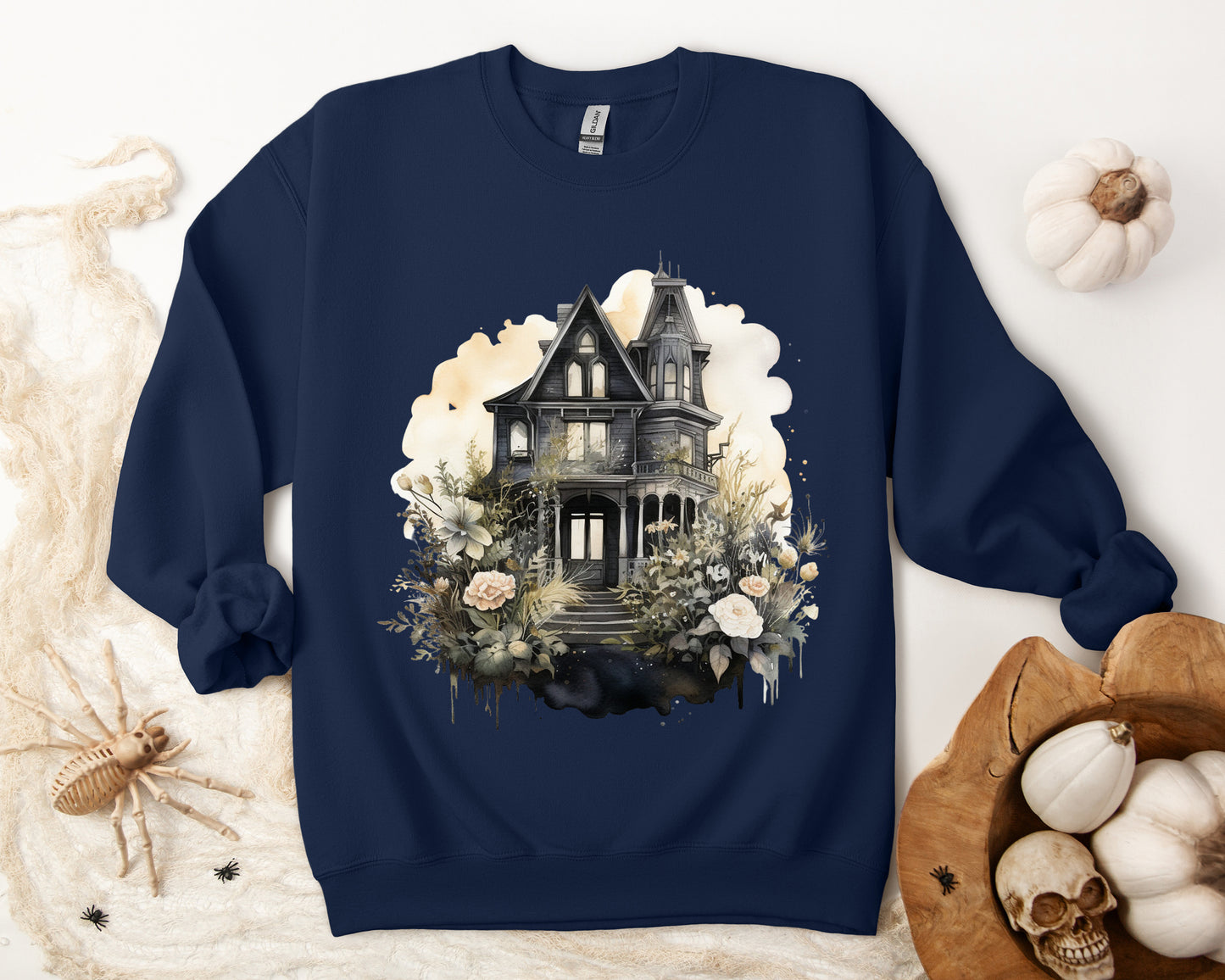 Halloween Boho Sweatshirt for Women featuring a mystical midnight haunted house illustration with boho design accents. Perfect for autumn festivities and casual wear. Available in multiple dark and light colors and sizes. Gildan 18000 sweatshirt in Navy. ReadyShirtAim.com