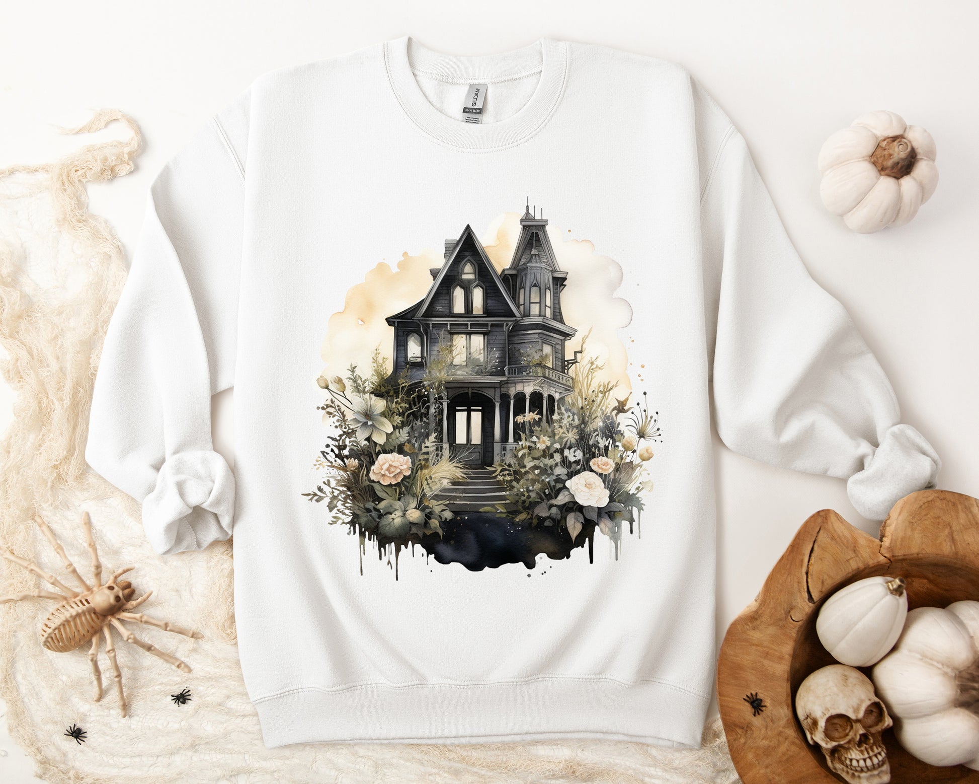 Halloween Boho Sweatshirt for Women featuring a mystical midnight haunted house illustration with boho design accents. Perfect for autumn festivities and casual wear. Gildan 18000 sweatshirt in White. ReadyShirtAim.com