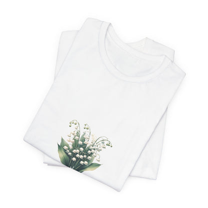 A t-shirt featuring a beautiful Lily of the Valley for May with the quote “Be your own reason to smile.” Perfect for May birthdays and floral art lovers. Comfortable and stylish for casual outings or celebrations. Bella+Canvas 3001 t-shirt in white. ReadyShirtAim.com