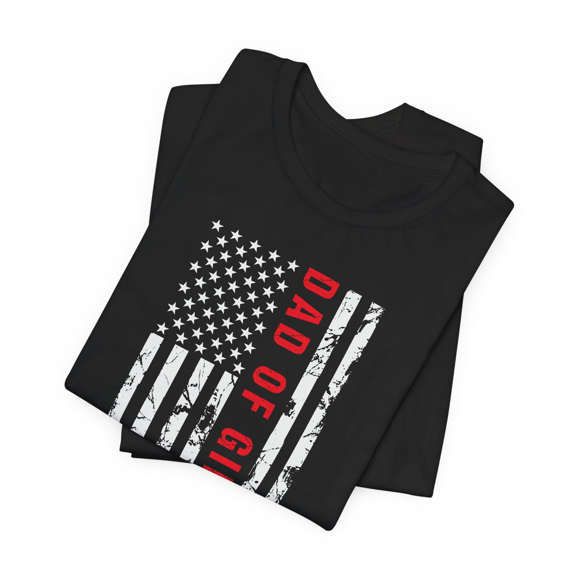 A dark-colored t-shirt featuring a grungy American flag design with the text "Dad of girls #outnumbered" in white and red. Perfect for Father's Day, Fourth of July, and patriotic dads who love humor. Comfortable and stylish for casual wear. Bella+Canvas 3001 t-shirt in black. ReadyShirtAim.com