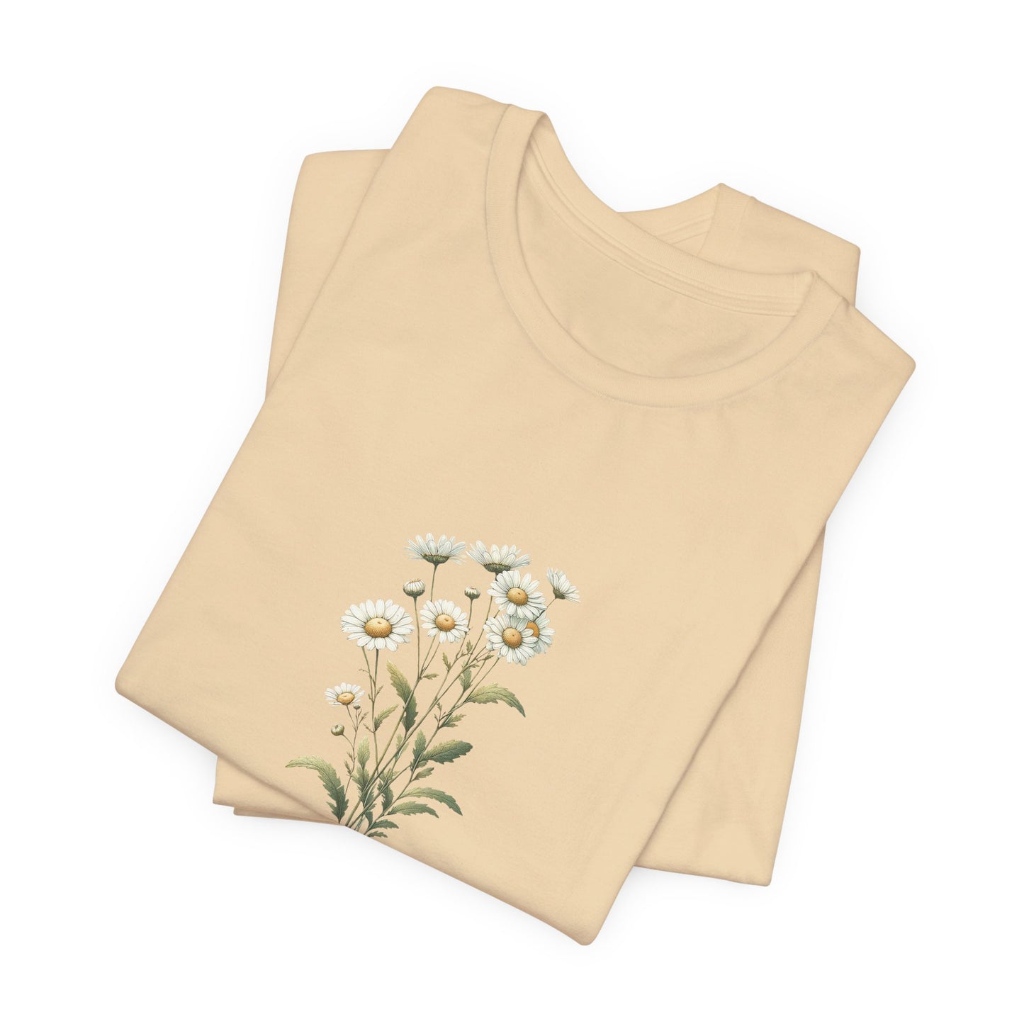 A t-shirt featuring a beautiful daisy for April with the quote “You were made to bloom.” Perfect for April birthdays and floral art lovers. Comfortable and stylish for casual outings or celebrations. Bella+Canvas 3001 t-shirt in soft cream. ReadyShirtAim.com