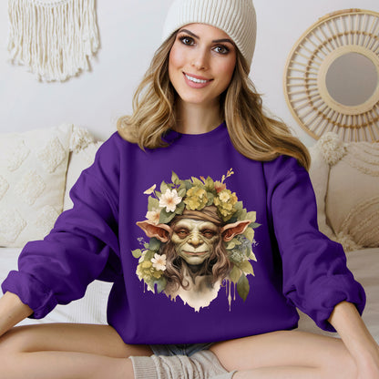 Creepy Cute Goblin Floral Boho Halloween Sweatshirt for women. Features a charming goblin surrounded by muted florals. Perfect for Halloween celebrations. Available in multiple dark and light colors and sizes. Gildan 18000 sweatshirt in Purple. ReadyShirtAim.com