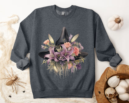 Elegant Witchy Blooms Sweatshirt with a watercolor illustration of a black witch hat and flowers in purple, pink, and green. Available in multiple dark and light colors and sizes. Gildan 18000 sweatshirt in Dark Grey Heather. ReadyShirtAim.com