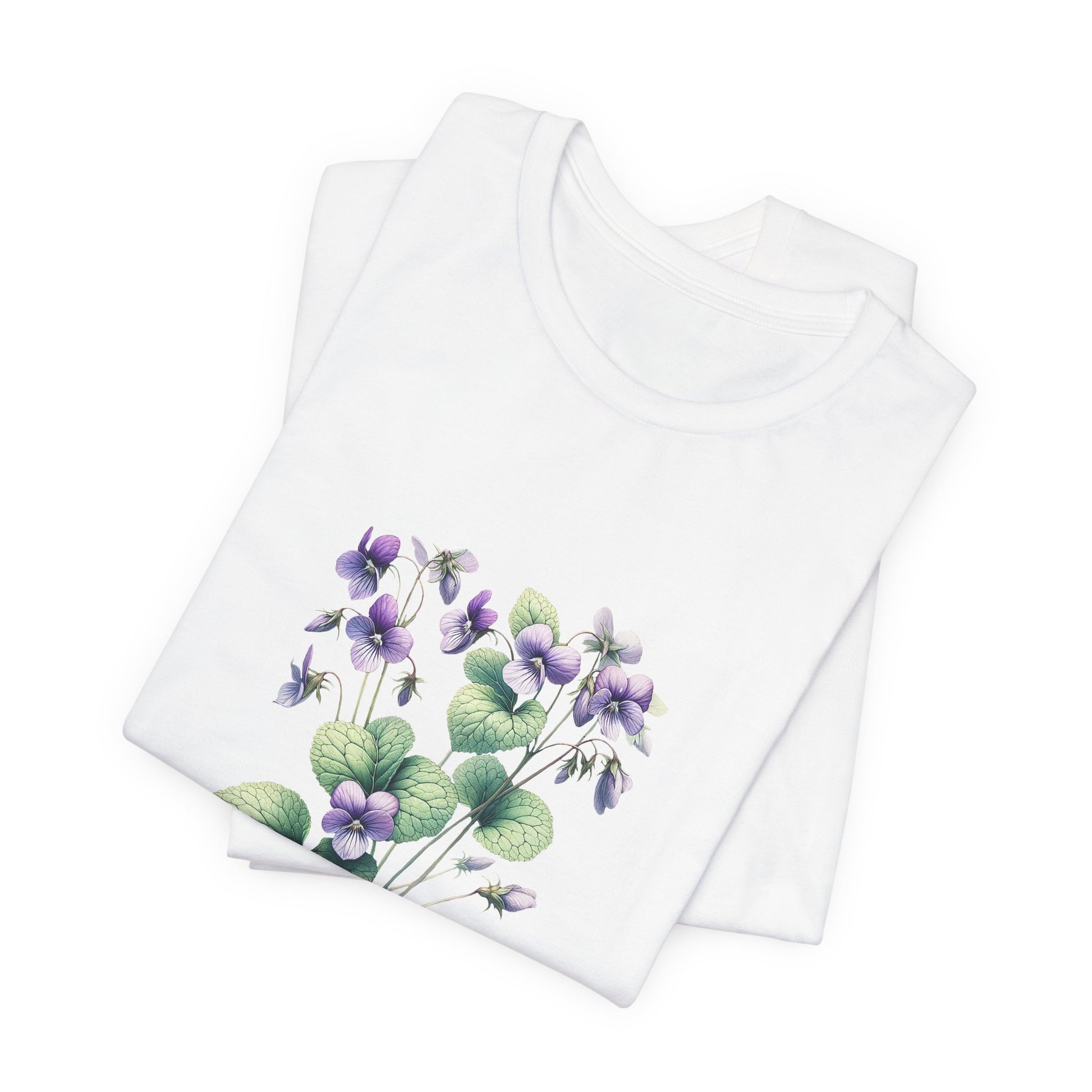 A t-shirt featuring a beautiful violet for February. Perfect for February birthdays and floral art lovers. Comfortable and stylish for casual outings or celebrations. Bella+Canvas 3001 t-shirt in white. ReadyShirtAim.com