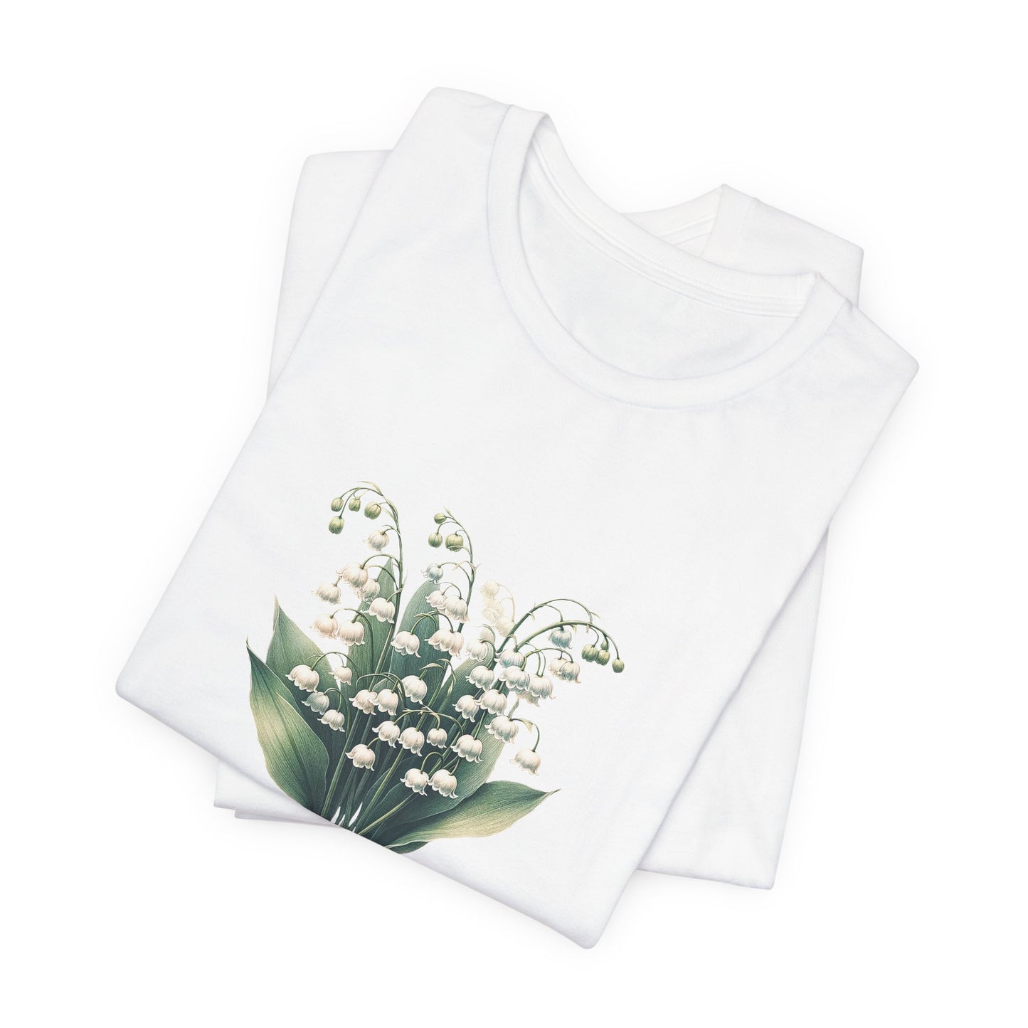 A t-shirt featuring a beautiful Lily of the Valley for May. Perfect for May birthdays and floral art lovers. Comfortable and stylish for casual outings or celebrations. Bella+Canvas 3001 t-shirt in white. ReadyShirtAim.com