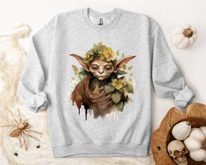 Mystical Goblin Boho Halloween Sweatshirt with a hand-drawn goblin illustration and boho-inspired design elements. Perfect for Halloween celebrations. Available in multiple dark and light colors and sizes. Gildan 18000 sweatshirt in Ash. ReadyShirtAim.com