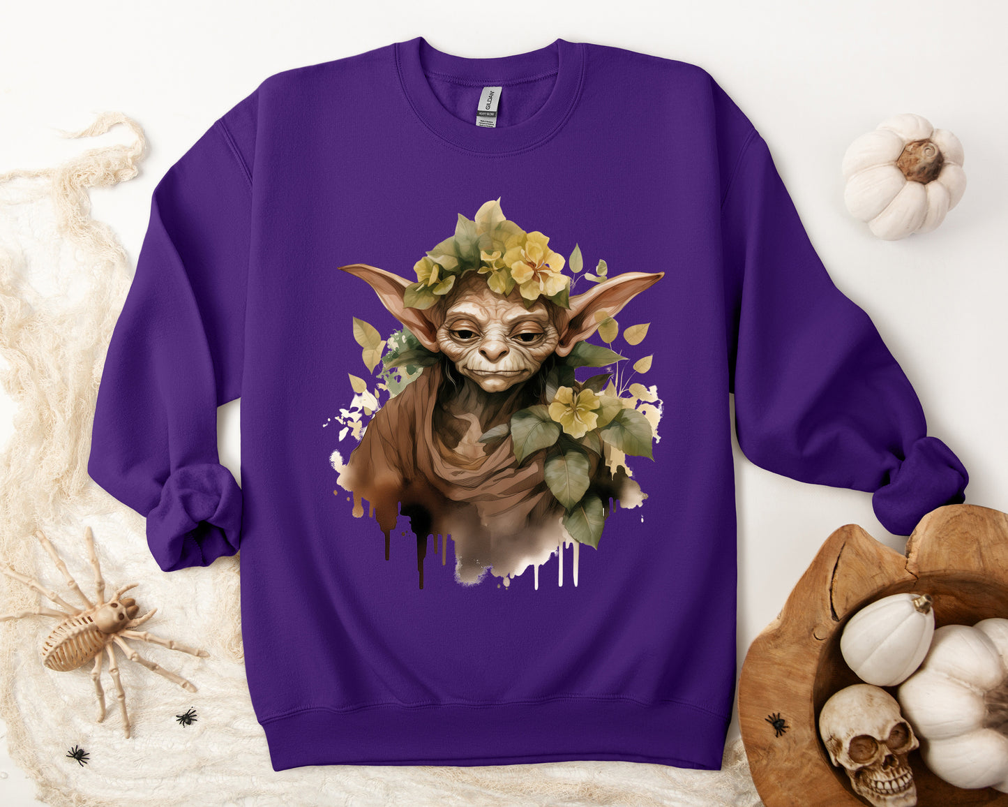 Mystical Goblin Boho Halloween Sweatshirt with a hand-drawn goblin illustration and boho-inspired design elements. Perfect for Halloween celebrations. Gildan 18000 sweatshirt in Purple. ReadyShirtAim.com