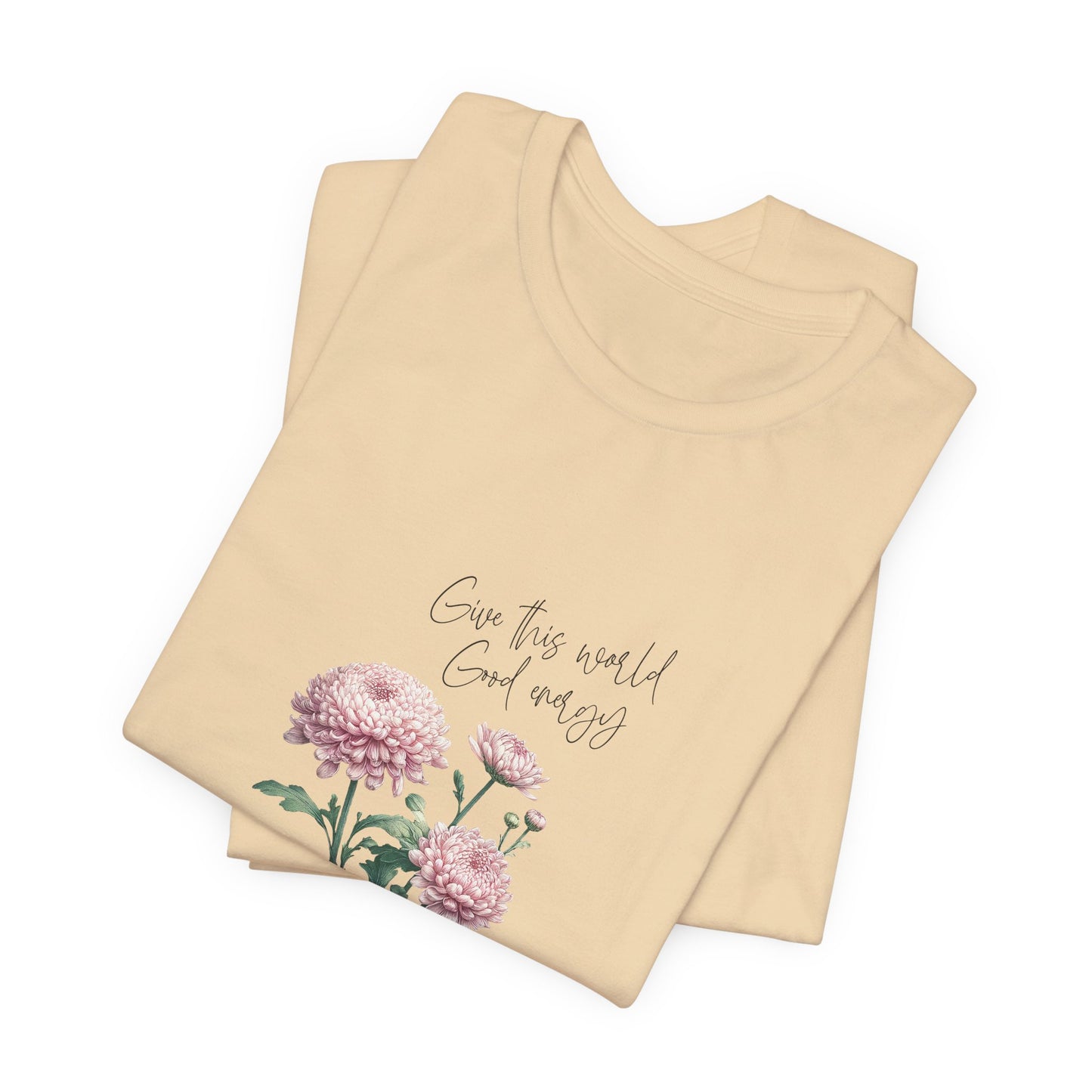 A t-shirt featuring a beautiful chrysanthemum for November with the quote “Give this world good energy.” Perfect for November birthdays and floral art lovers. Comfortable and stylish for casual outings or celebrations. Bella+Canvas 3001 t-shirt in soft cream. ReadyShirtAim.com