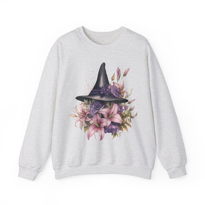 Enchanting Bohemian Witch Hat Sweatshirt with a watercolor illustration of a black witch hat surrounded by flowers in purple, pink, and green tones. Available in multiple dark ang light colors and sizes. Gildan 18000 sweatshirt in ash. ReadyShirtAim.com