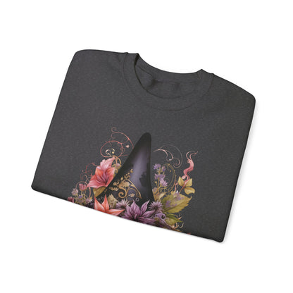 Whimsical Witch Hat Sweatshirt with a watercolor illustration of a black witch hat surrounded by flowers in purple, pink, and green. Available in multiple dark and light colors and sizes. Gildan 18000 sweatshirt in Dark Grey Heather. ReadyShirtAim.com